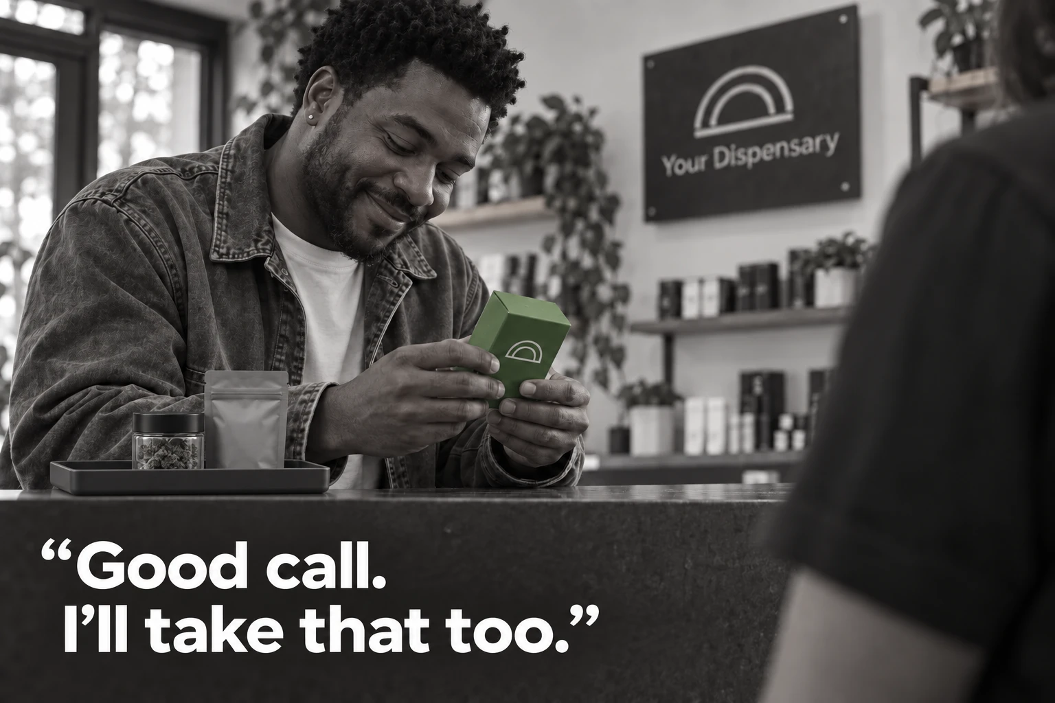 A customer chooses a green recommended product in addition to the original items on the counter. Good call. I’ll take that too.